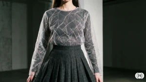 10. Layered Sheer Fabrics Creative winter layering featuring a sheer mesh top under a heavy, tailored wool coat for visual depth. 2026 footwear.