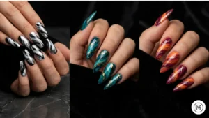 Alt Text: Bold and dramatic marble acrylic nail design with high-contrast black and white veins.