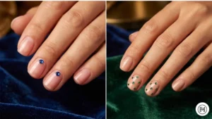 14. Jewel-Toned Gems Alt Text: Sophisticated jewel-toned gems on short nails adorned with tiny sapphire accents and delicate emerald green rhinestones.