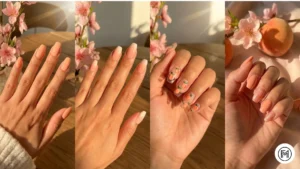 Alt Text: Soft peachy acrylic nails with natural warm tones and tiny fruit nail art.