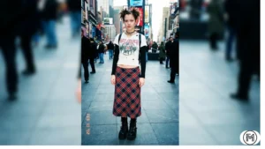 
Outfit 20: Y2K inspired plaid midi skirt with a graphic tee and chunky platform boots.

