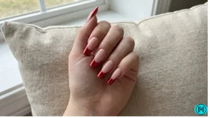 Natural-looking sheer nude French tip nails with a minimalist style.