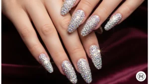 Alt Text: High-end Swarovski crystal acrylic nails with intense sparkle and luxury gemstones.