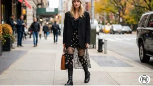 color-block midi skirt styled with a cream sweater and bright white boots.

