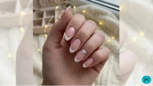 French tip nails with creative red outlines tracing the nail edges.