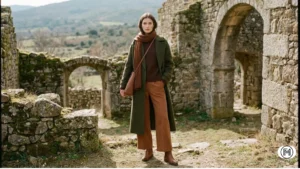 3. Deep Earth Tones Winter 2026 fashion layers in mineral neutrals and deep earth tones like olive green and chocolate brown. 