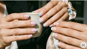 Matte & Geometric: Modern matte finish short nails with sharp geometric shapes and metallic gold line accents.
