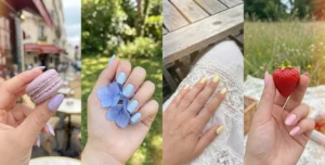 A four-panel photo of hands with pastel nails outdoors: far left, lavender nails holding a macaron; center left, light blue nails holding hydrangea petals; center right, pale yellow nails on a white lace dress; far right, light pink nails holding a strawberry.