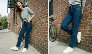 A diptych photograph showing a smiling woman leaning against a brick wall next to a bicycle. On the left, a full-body shot shows her laughing, wearing dark wash straight-leg jeans, a grey sweatshirt, and white sneakers. On the right, a close-up focuses on the fit of the dark blue jeans at the hips and legs, and the clean white sneakers.