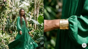 3. Emerald Green Maxi Dress Alt Text: Editorial shots of a Black woman in a rich emerald green maxi dress styled with chunky gold jewelry in a garden setting. 