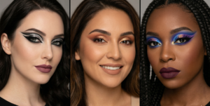 A wide landscape photograph of vast desert sand dunes with undulating shapes and deep shadows in the late afternoon sun. A caravan of camels walks across a dune in the distance.