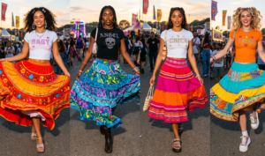 Four women showcasing a fusion of McBling and traditional Mexican fashion by wearing brightly colored, tiered Campesina midi skirts with rhinestone Y2K baby tees.
