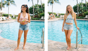 Two women wearing casual Y2K summer outfits featuring halter neck tops and denim mini shorts.