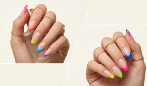 A clean manicure featuring a "Skittle" French tip design with a different bright neon color on each nail tip over a natural nude base.