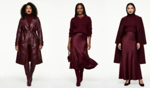 Three women wearing deep burgundy monochromatic outfits highlighting a vampy faux leather trench coat layered over matching knits and leather trousers.
