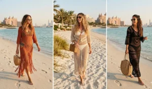 Three women wearing bohemian crochet maxi cover-ups over bikinis while walking on the beach in Palm Jumeirah.